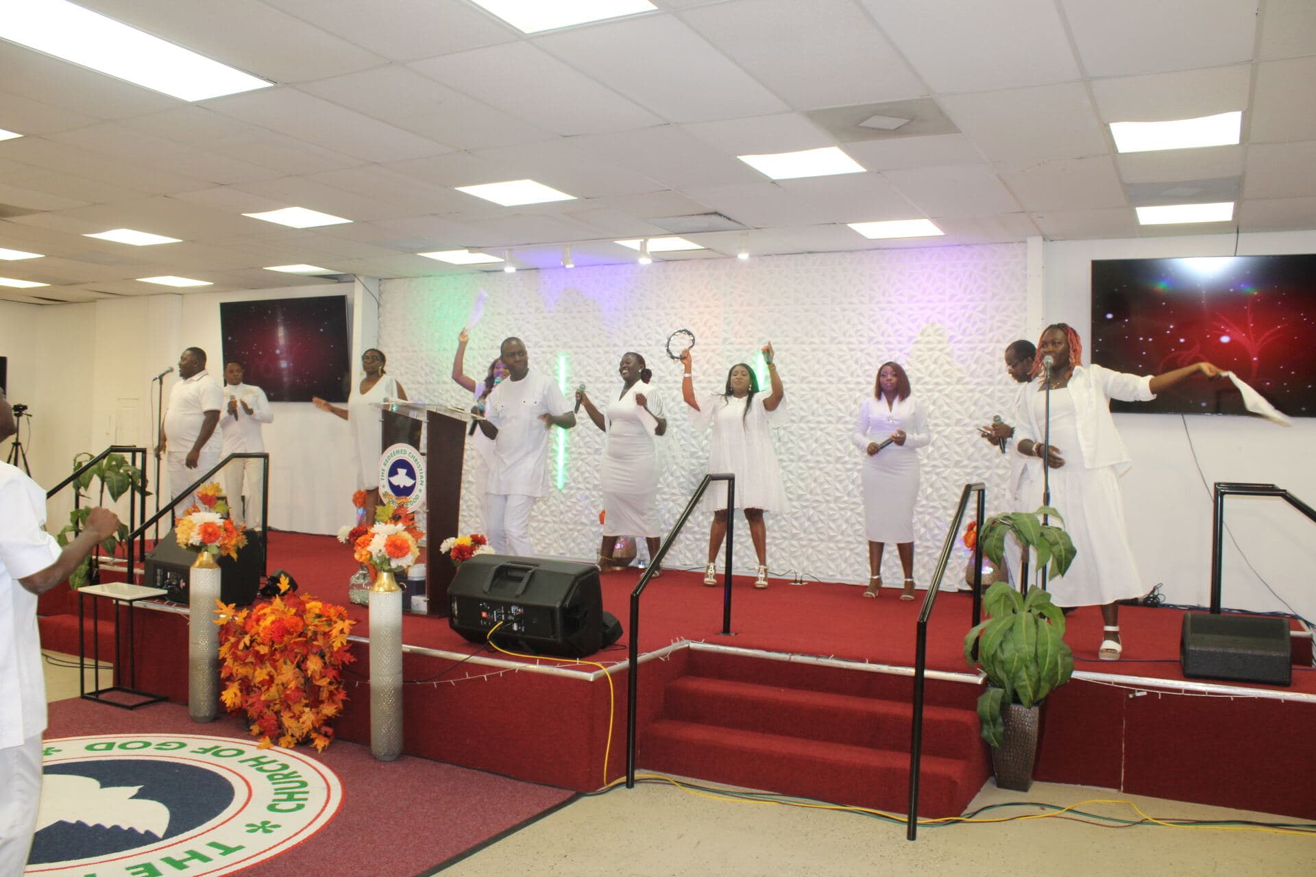 The Dunamis Choir ministering in white