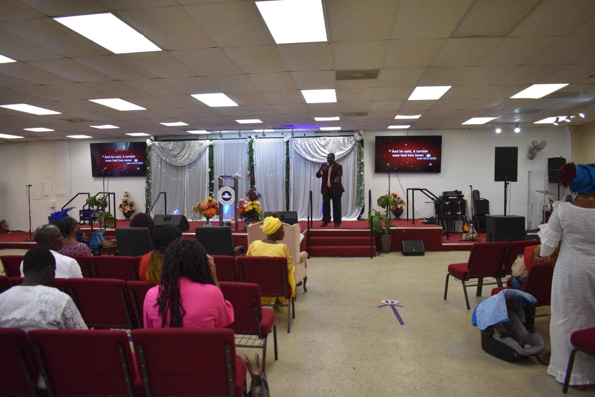 Members worshipping in the sanctuary